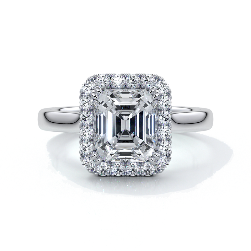 Emma Engagement ring emerald diamond halo cathedral platinum