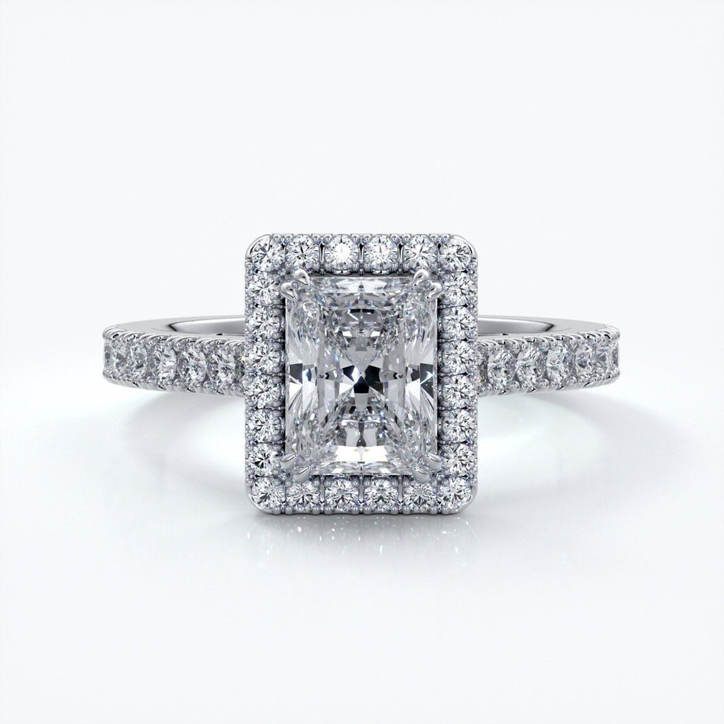 Iris Engagement Ring emerald diamond band halo