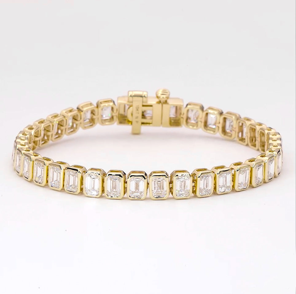 11 carat Emerald cut bezel set diamond tennis bracelet.