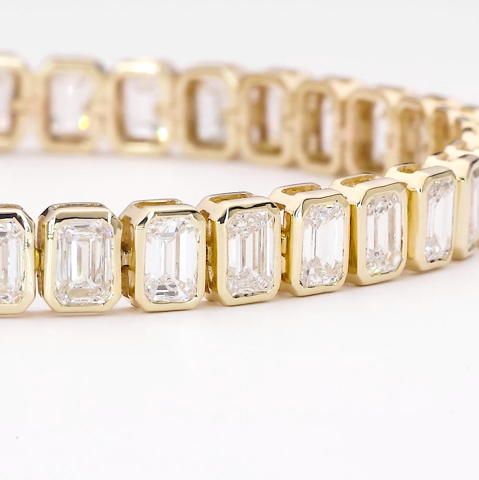 11 carat Emerald cut bezel set diamond tennis bracelet.