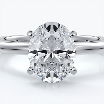 Cleo Engagement ring oval diamond 4 claw 18ct white gold