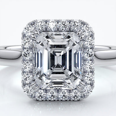 Emma Engagement ring emerald diamond halo cathedral platinum