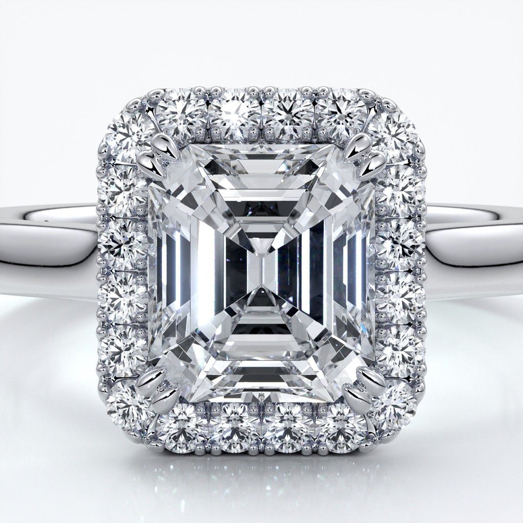 Emma Engagement ring emerald diamond halo cathedral platinum