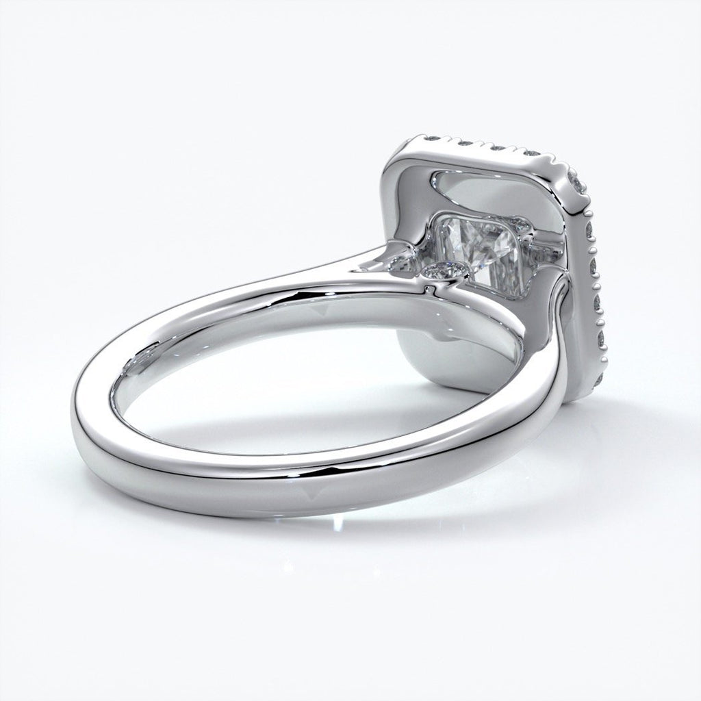 Emma Engagement ring emerald diamond halo cathedral platinum