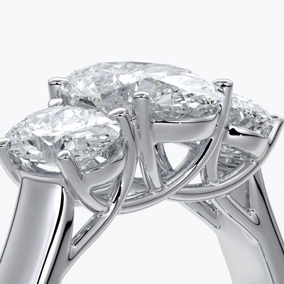 Lucida Engagement ring oval trilogy 4 claw cathedral 18ct white gold