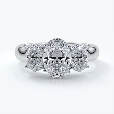 Lucida Engagement ring oval trilogy 4 claw cathedral 18ct white gold