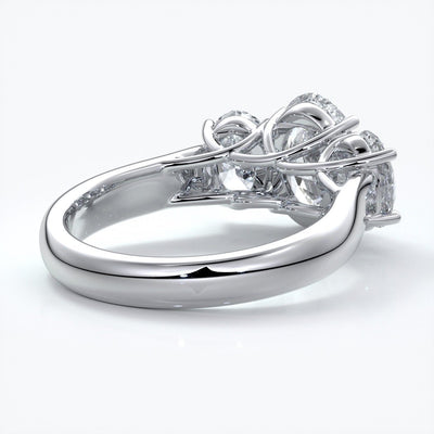 Lucida Engagement ring oval trilogy 4 claw cathedral 18ct white gold