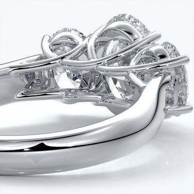 Lucida Engagement ring oval trilogy 4 claw cathedral 18ct white gold
